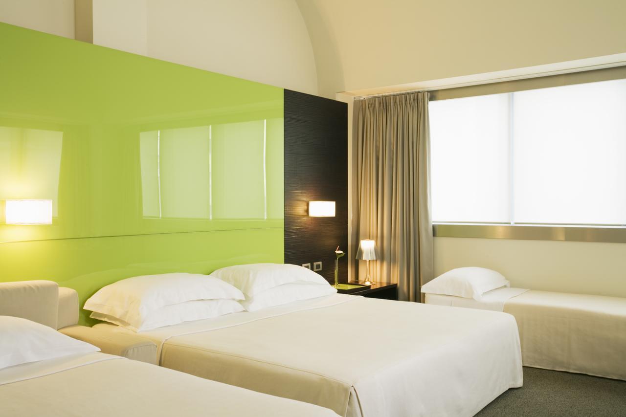 Una Hotels T Hotel กาญารี ภายนอก รูปภาพ