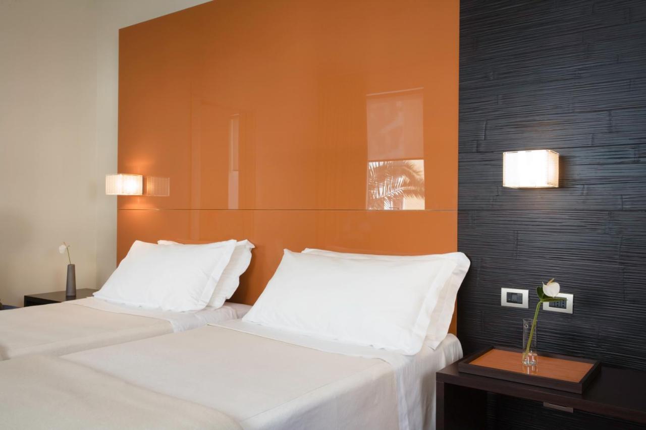 Una Hotels T Hotel กาญารี ภายนอก รูปภาพ